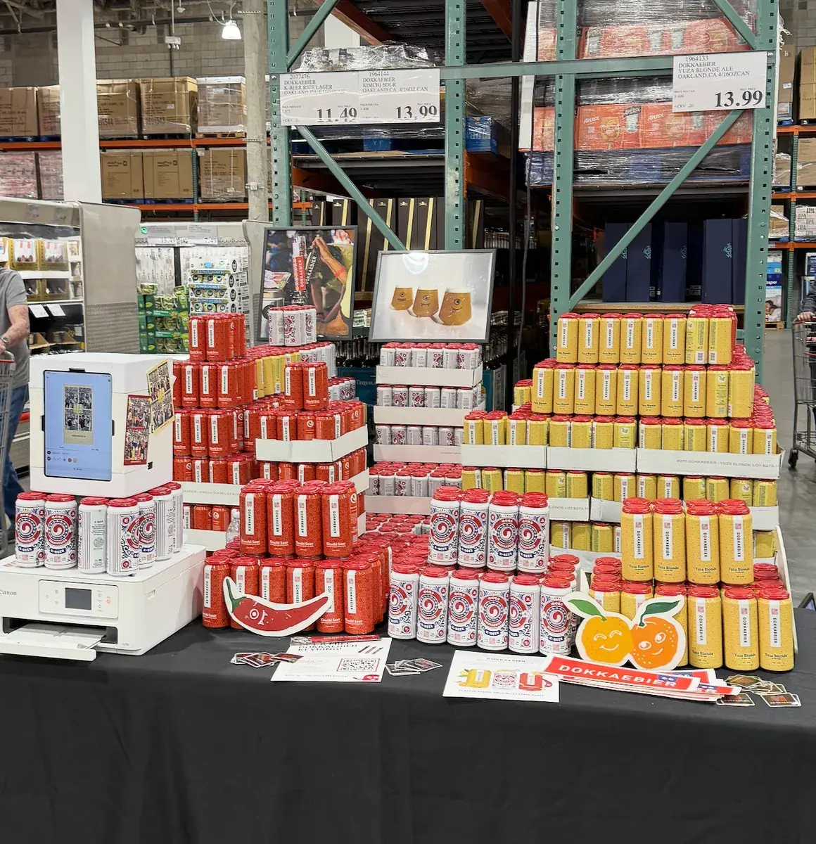 A my4cut mini photo booth on a product display with printed four-cut photos